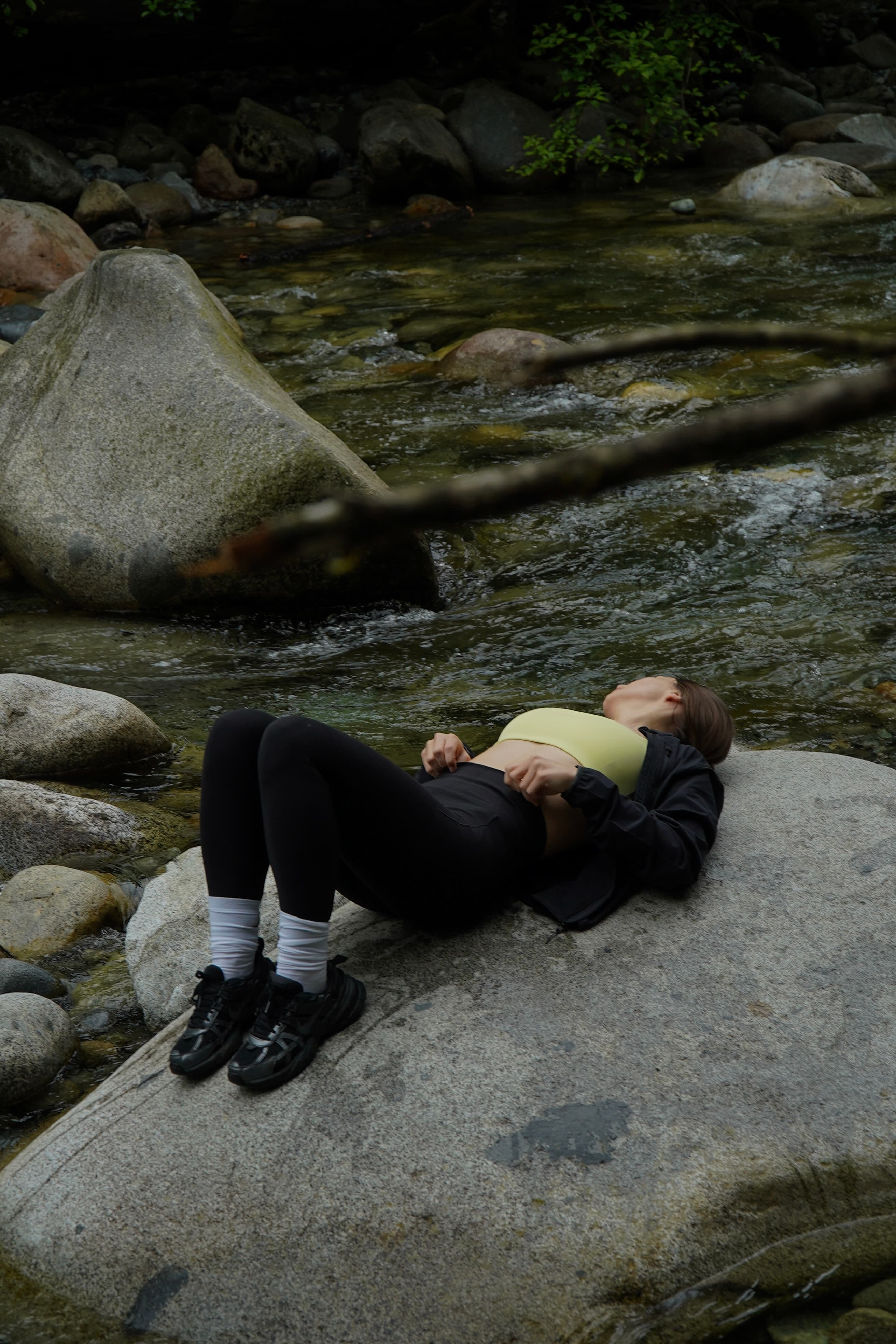 Rest on the rocks — Athleta Sun Sports by the river