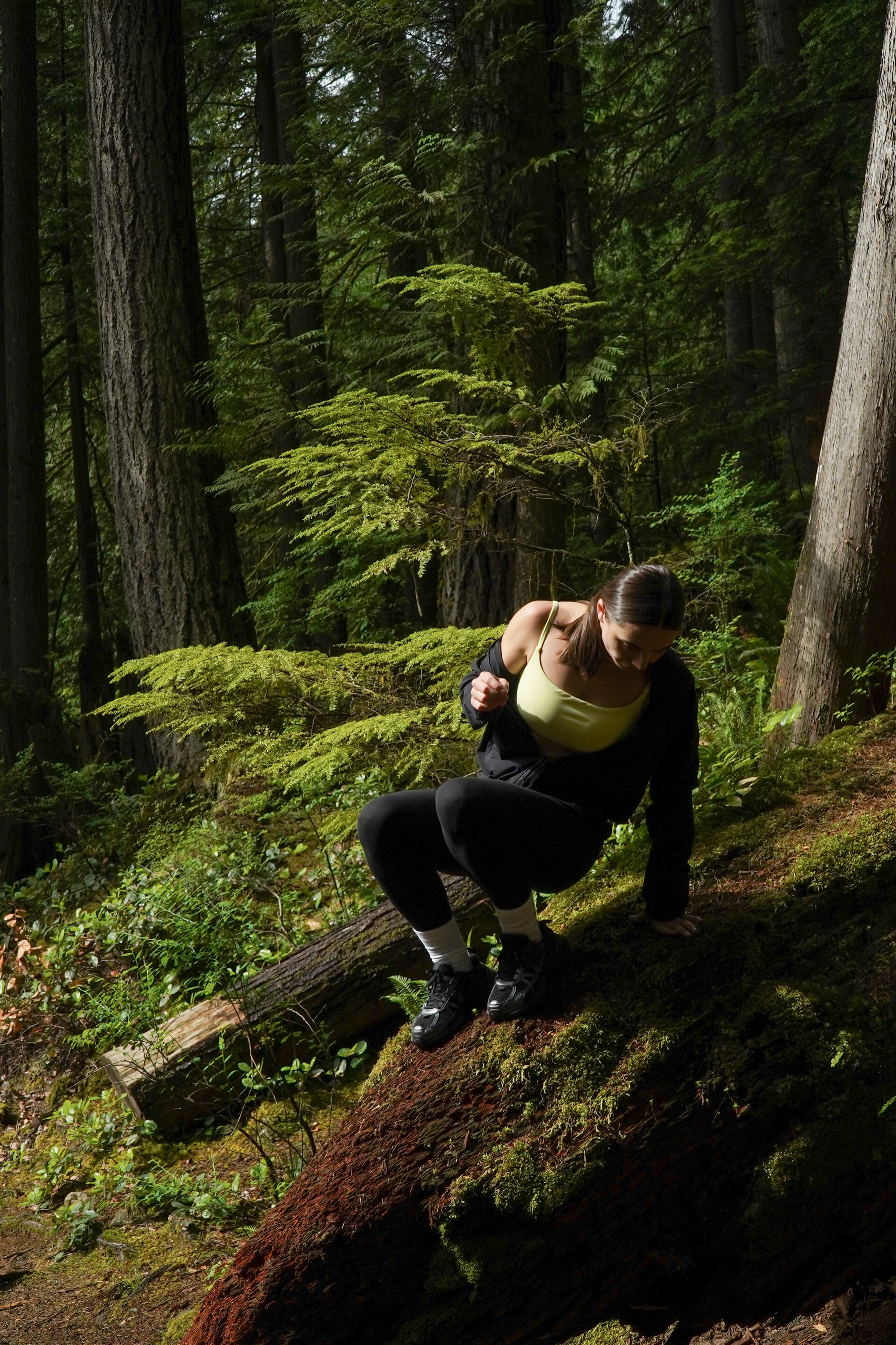 Athleta Sun Sports — climbing through the forest