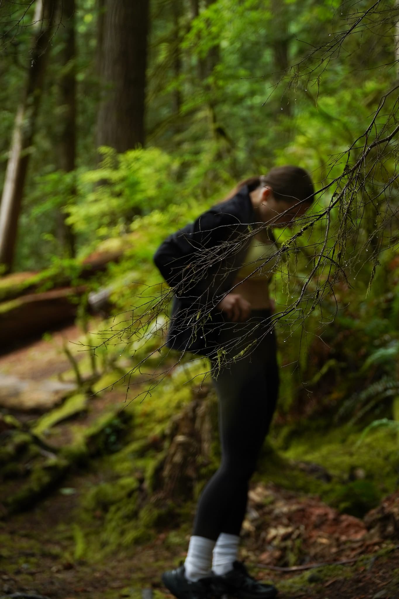Athleta Sun Sports — framed through branches in the rainforest