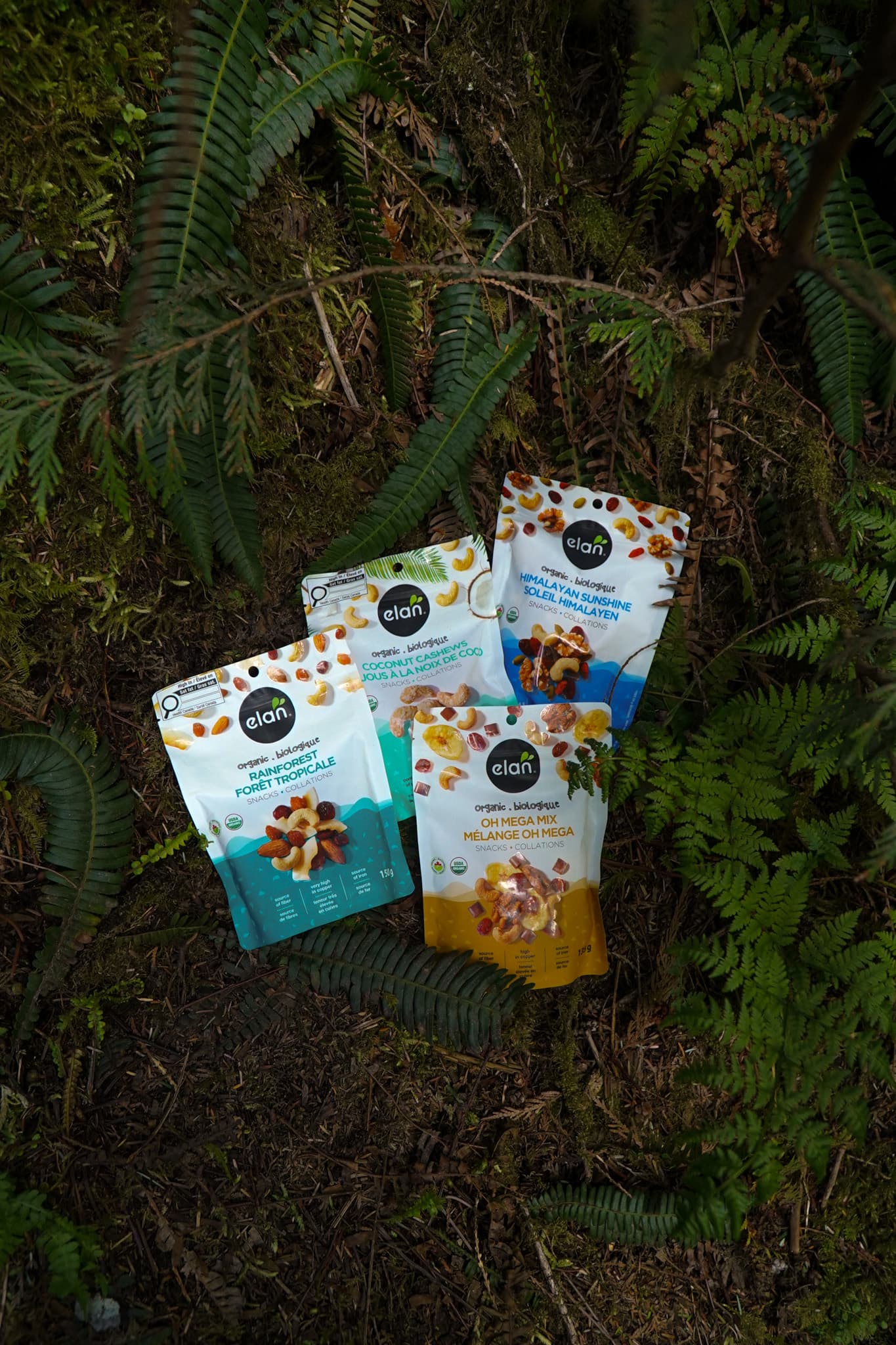 Holding the Élan Himalayan Sunshine pouch among the foxgloves
